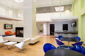 Party room with 20-foot ceilings, hdtvs, fireplace and full kitchen & bar